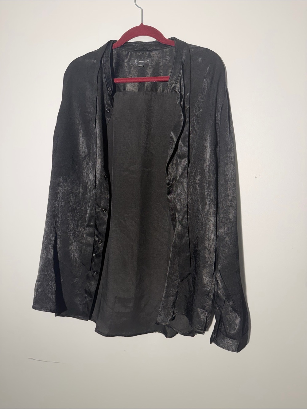 INC International Concepts blouse features a tie-neck detail and a textured
